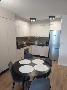 Η κουζίνα ή μικρή κουζίνα στο Targowa 53 - Green & Central