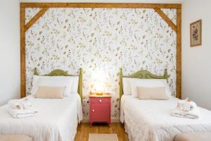 Ένα ή περισσότερα κρεβάτια σε δωμάτιο στο Casa rural Miel y Canela