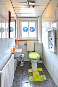 Vonios kambarys apgyvendinimo įstaigoje Ferienwohnungen Eibner