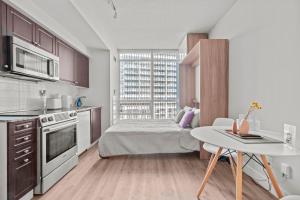 Cuina o zona de cuina de Charming Studio in Downtown Toronto