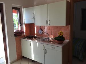 A kitchen or kitchenette at Villa Marilena
