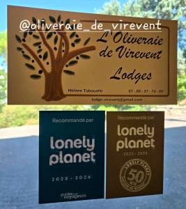 a sign for a library with a tree on it at Les lodges de l'oliveraie de Virevent in Grasse