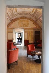 Posezení v ubytování Podere Castel Merlo Resort