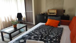 Postel nebo postele na pokoji v ubytování MgTels Apartman - with private parking