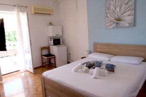 Postel nebo postele na pokoji v ubytování Guest House Villa Jadera + 129 fotografií