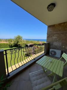 a balcony with a view of the ocean at Studio E32 Atia Resort Chernomoretz in Chernomorets