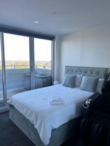 Ένα ή περισσότερα κρεβάτια σε δωμάτιο στο Penthouse with Great City view