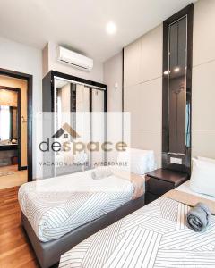 En eller flere senge i et værelse på Dorsett Bukit Bintang Residence by De Space + 35 billeder
