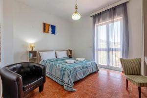 Ένα ή περισσότερα κρεβάτια σε δωμάτιο στο Casale- Il Giglio Rosa