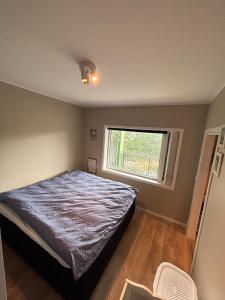 Ένα ή περισσότερα κρεβάτια σε δωμάτιο στο Nice apartment in Osundet