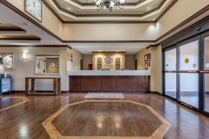 a large room with a lobby with a waiting area at Comfort Suites Rolla in Rolla
