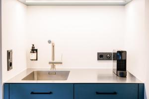 Η κουζίνα ή μικρή κουζίνα στο Margarethe Apartments Lech +70 φωτογραφίες