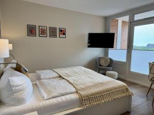 Postel nebo postele na pokoji v ubytování Salzwasser