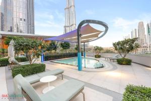 Φωτογραφία από το άλμπουμ του Grande Downtown Dubai - Luxury 2BR Apt with City Skyline View στο Ντουμπάι