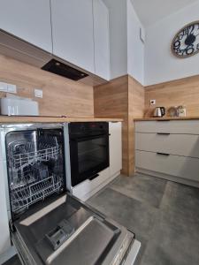Dapur atau dapur kecil di Apartament Paderewskiego Two Bedrooms Private Garage FV Self Check-in