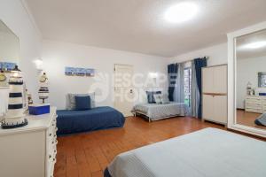 En eller flere senge i et værelse på Casa do Levante + 14 billeder