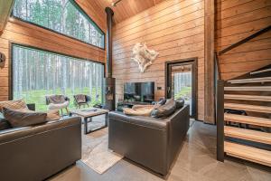 Et opholdsområde på Villa Tieva A Ski-in Ski-out with private Jacuzzi by Aavalevi + 47 billeder