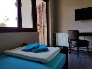 Postelja oz. postelje v sobi nastanitve Apartmani Simić Valjevo