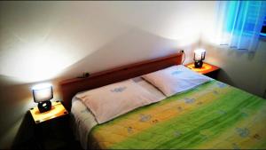 Posteľ alebo postele v izbe v ubytovaní Apartments Kalac