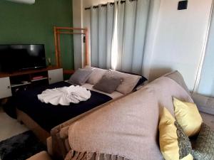 Postel nebo postele na pokoji v ubytování Charmosa acomodação com vista para o mar