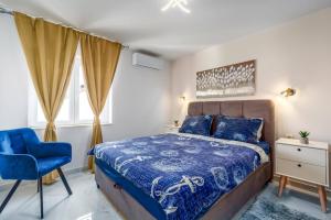 En eller flere senge i et værelse på Villa Melani Vita by Villa Plus + 27 billeder