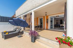 En balkon eller terrasse på Villa Melani Vita by Villa Plus