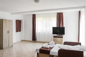 TV a/nebo společenská místnost v ubytování Marcos