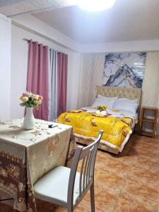 Ένα ή περισσότερα κρεβάτια σε δωμάτιο στο L1 Family Studio Apartment Room near Damosa IT Park, SM Lanang & Airport