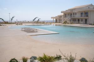 Swimmingpoolen hos eller tæt på GuestHost - Borgo 84 Marzamemi - Hermes Apartment