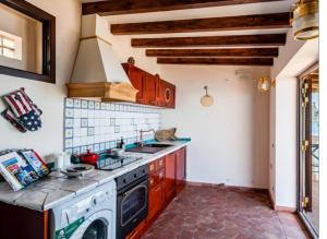 a kitchen with a stove and a sink at VitaLenta in Naxos in Giardini Naxos