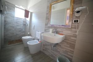Koupelna v ubytování Hotel Albatros