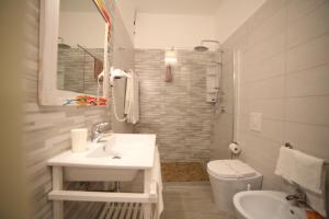 Koupelna v ubytování Hotel Albatros