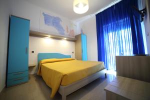 Postel nebo postele na pokoji v ubytování Hotel Albatros