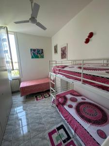 Katil atau katil-katil dalam bilik di Appartamento vacanze Golban +2 gambar