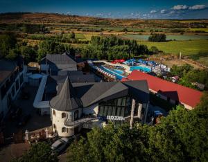an aerial view of a resort with a water park at SV Hotel, Restaurant & Airport Parking in Todoreshty