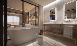 a bathroom with a large tub and two sinks at Grand Sunset Princess - All Inclusive in Playa del Carmen