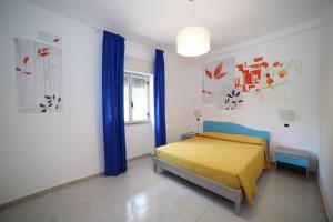 Postel nebo postele na pokoji v ubytování Hotel Albatros