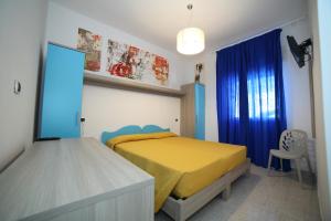 Postel nebo postele na pokoji v ubytování Hotel Albatros