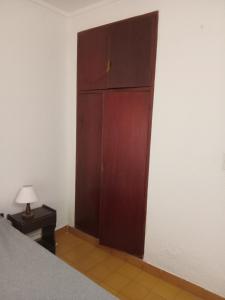 En eller flere senge i et værelse på Departamentos a 100 mts del mar