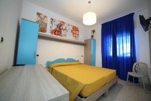 Postel nebo postele na pokoji v ubytování Hotel Albatros