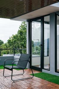 Μπαλκόνι ή βεράντα στο GreysCo Villa Batu Panderman