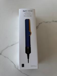 a pen in a paper bag on a counter at Appartement T3 in Balaruc-le-Vieux