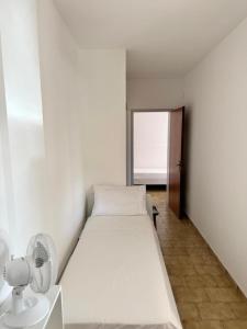 Ένα ή περισσότερα κρεβάτια σε δωμάτιο στο Fontane Felini +22 φωτογραφίες