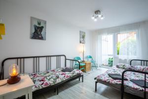Ένα ή περισσότερα κρεβάτια σε δωμάτιο στο Holiday Homes Puck