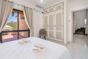 Postel nebo postele na pokoji v ubytování Villa das Nogueiras + 30 fotografií