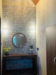 a bathroom with a mirror on a wall at Fair View Cottage in Ella +117 photos