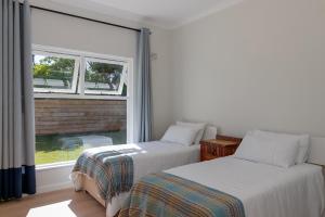 Postel nebo postele na pokoji v ubytování Leisure Isle Getaway