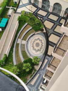 an overhead view of a building with a spiral garden at CozyCity Retreat 2 Studio Apartment with Kitchen Perfect for longer stays in Lucknow