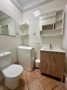 Ένα μπάνιο στο Sea View Bungalow in Los Gigantes +10 φωτογραφίες