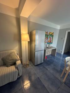 Η κουζίνα ή μικρή κουζίνα στο Appartamento Tramontana Portorosa - Residence Delfino